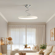 Close-up detail of modern semi flush mount ceiling light showing smooth diffuser and edge design