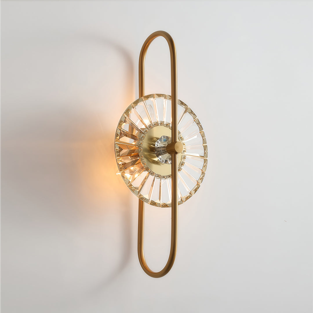 Serene crystal wall sconces lighting featuring glass shade chandelier styling creating warm glow on neutral wall surface.