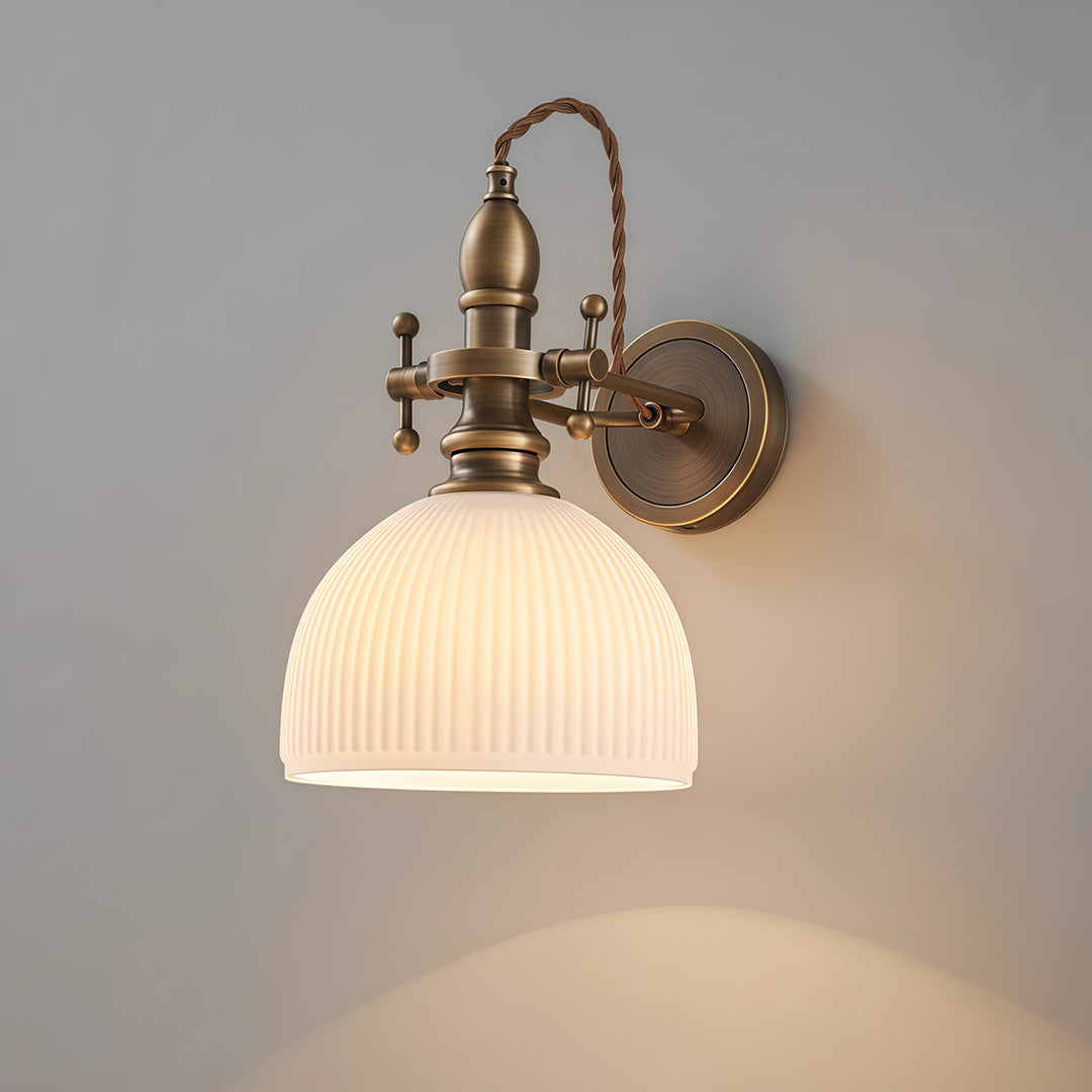 Serene indoor wall mount lights with glass shade chandelier aesthetic providing soft downlighting with frosted ribbed glass shade.