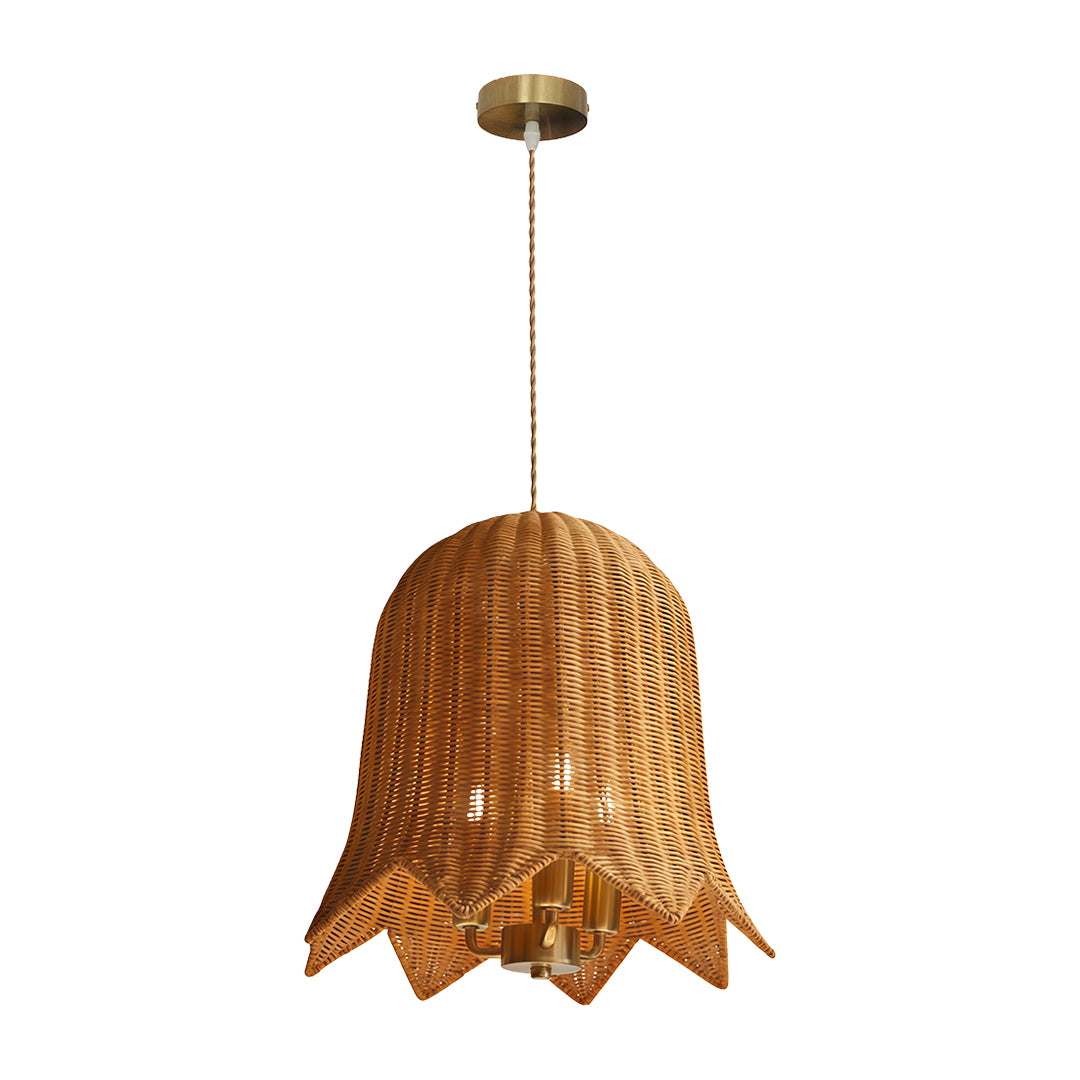 A set of rattan pendant lights hanging over a modern dining table, creating a cozy and inviting atmosphere.