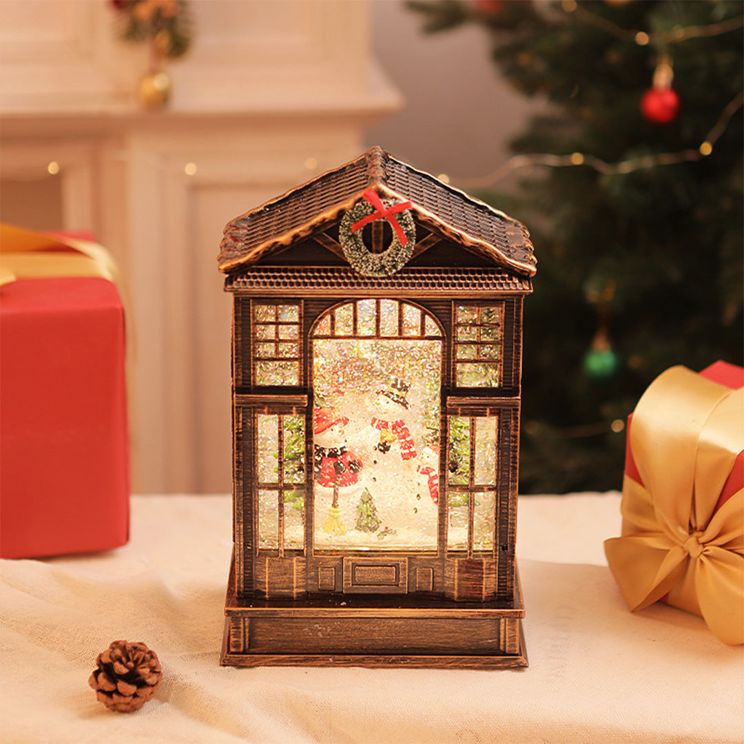 Set of warm-glowing christmas decorations with light designed as antique bronze lanterns.