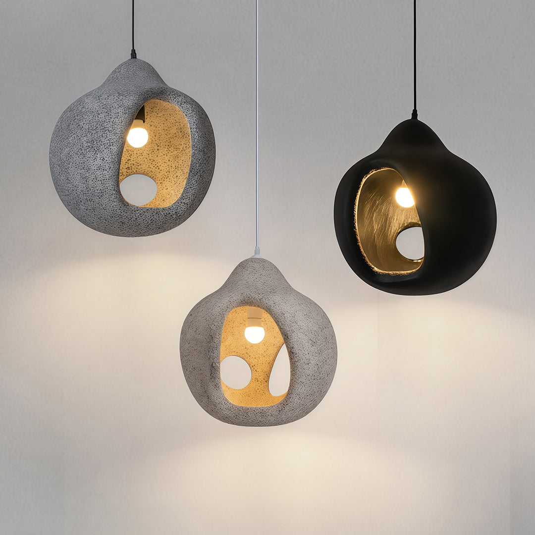 Set of Nordic Wabi Sabi Pendant Lights in gray and black tones, creating soft ambient illumination.