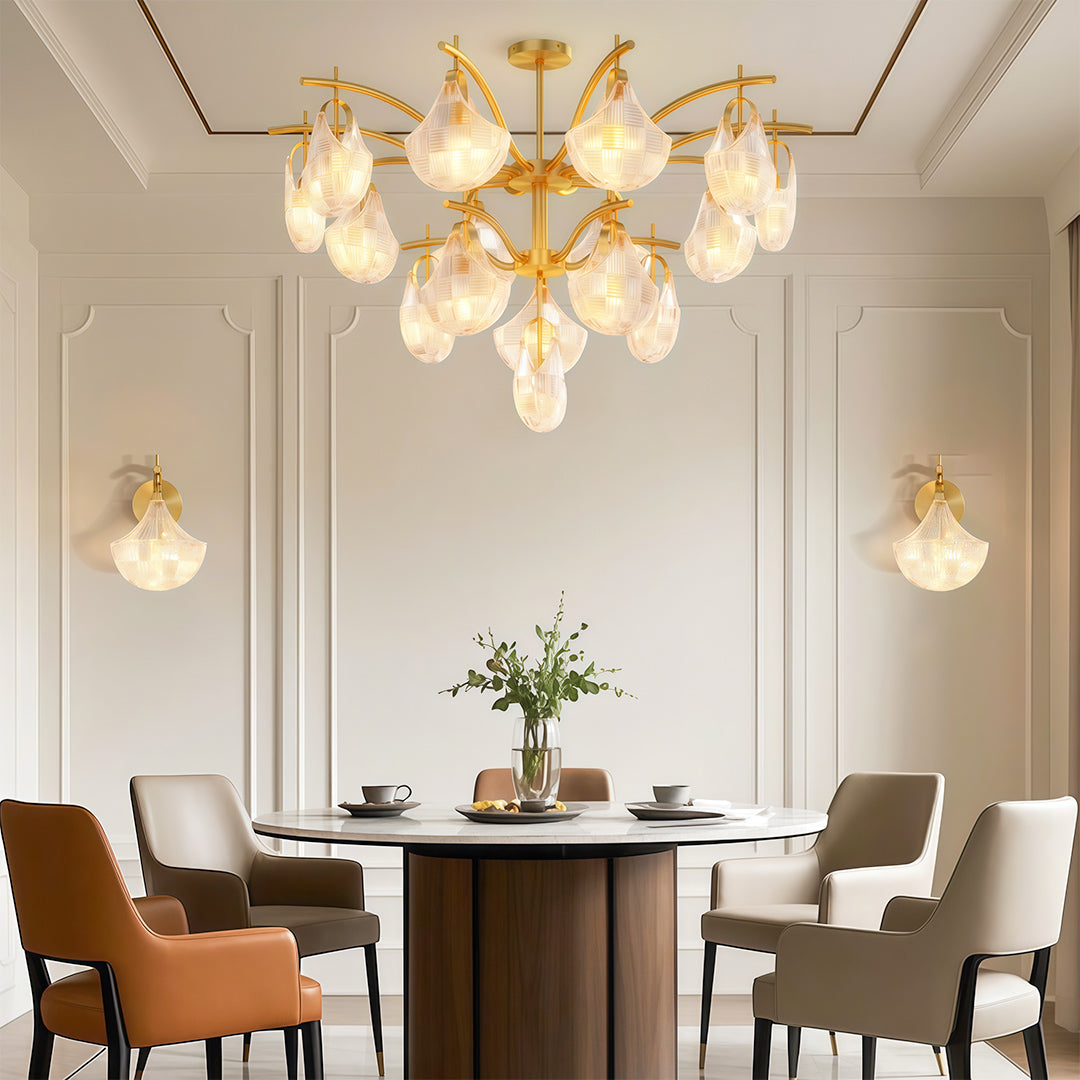 Modern luxury shell chandelier light creating elegant atmosphere in dining room with rust-colored chairs.