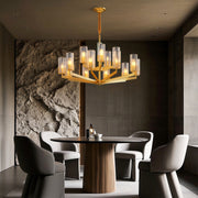 Shell chandeliers illuminating luxurious dining room with dark walls and contemporary white chairs