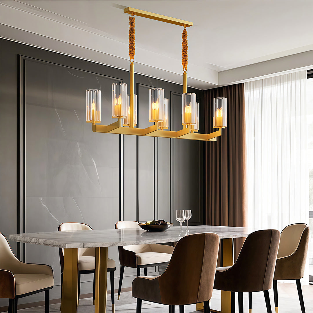 Shell chandeliers creating warm ambiance in sophisticated dining room with brown upholstered chairs