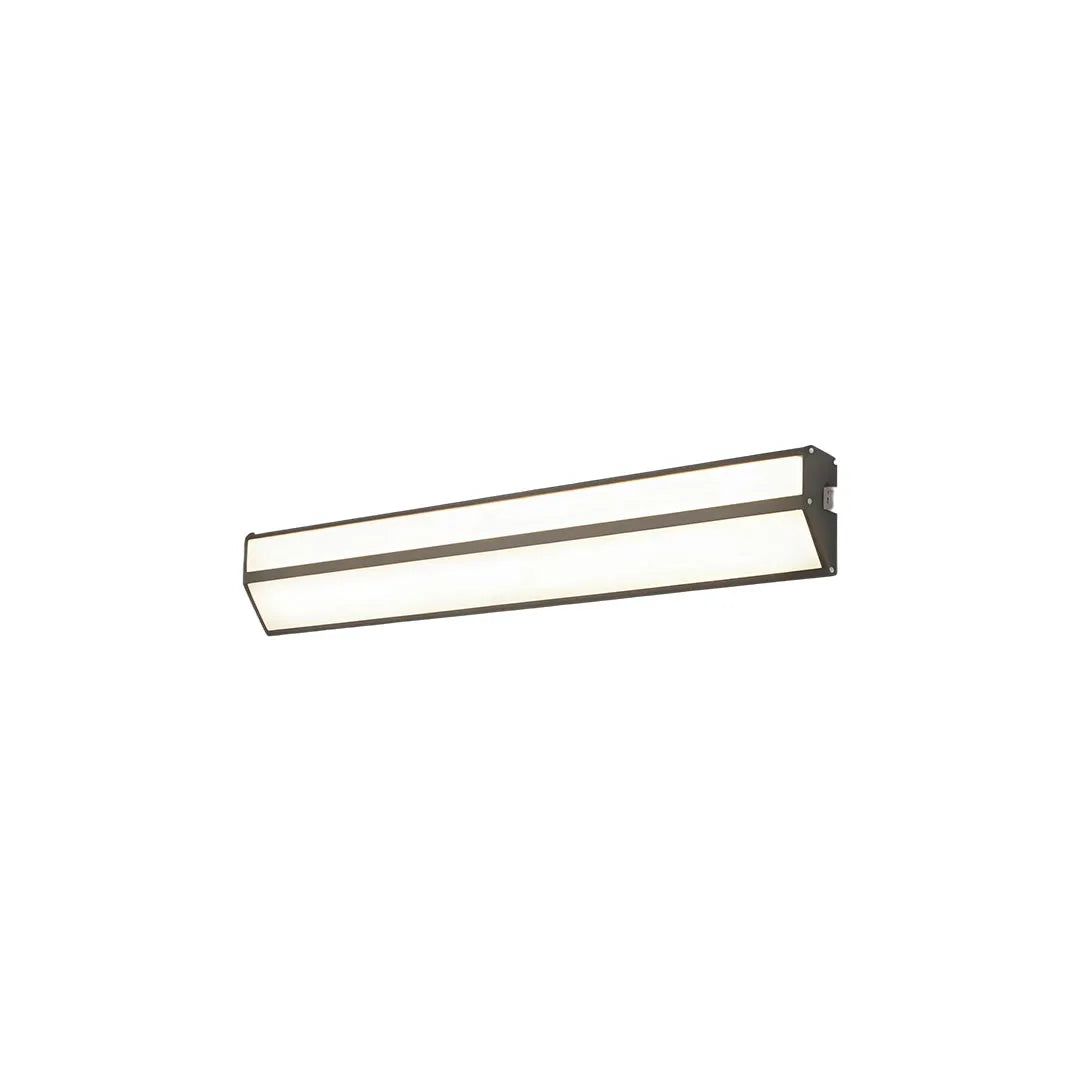 Short LED linear wall sconce in a white background product view with warm illumination.