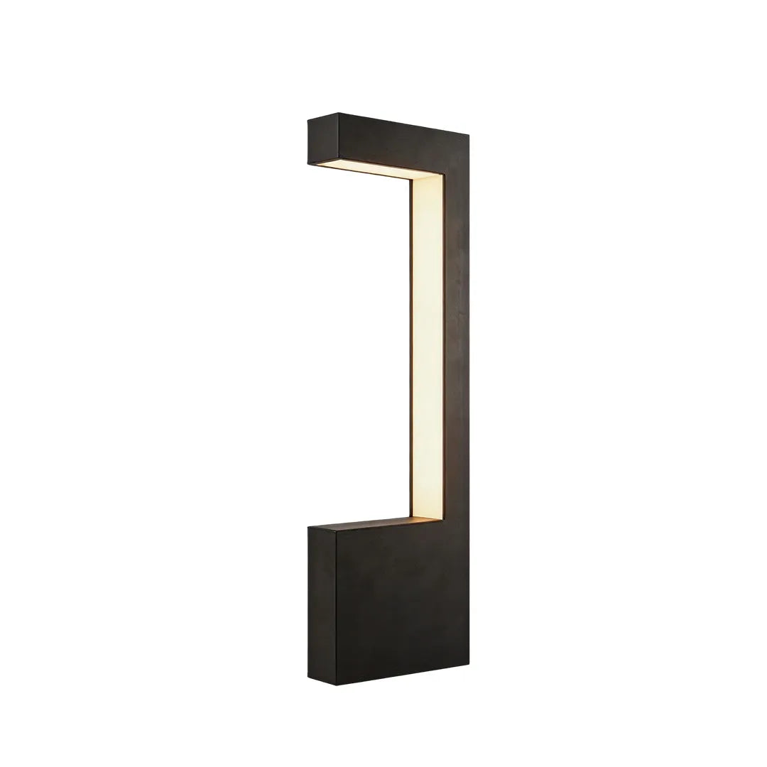 Short modern LED bollard light with black L shaped frame and warm illumination