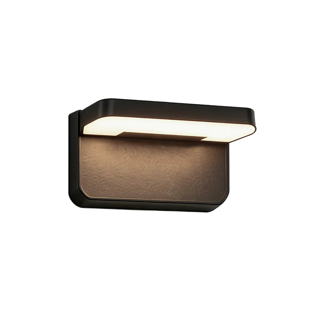 Short modern outdoor wall light with black frame and warm LED illumination