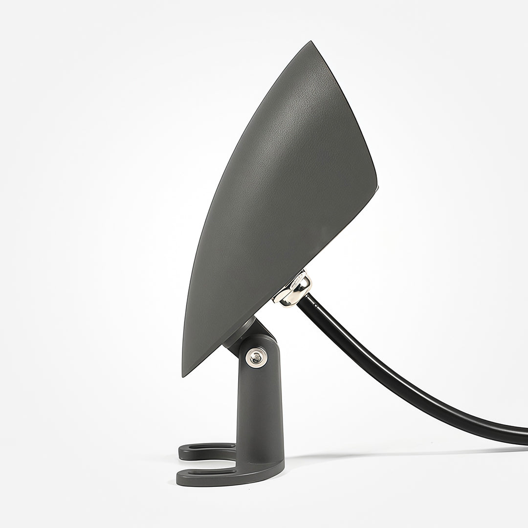 Side profile of decorative wall wash light with curved top cover.