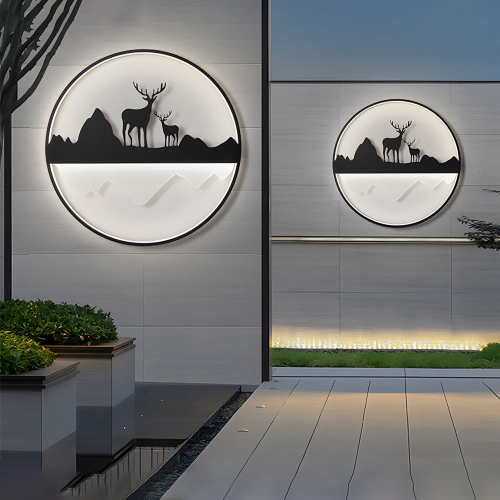 Silhouette wall light with a close-up of the deer and mountain silhouette.