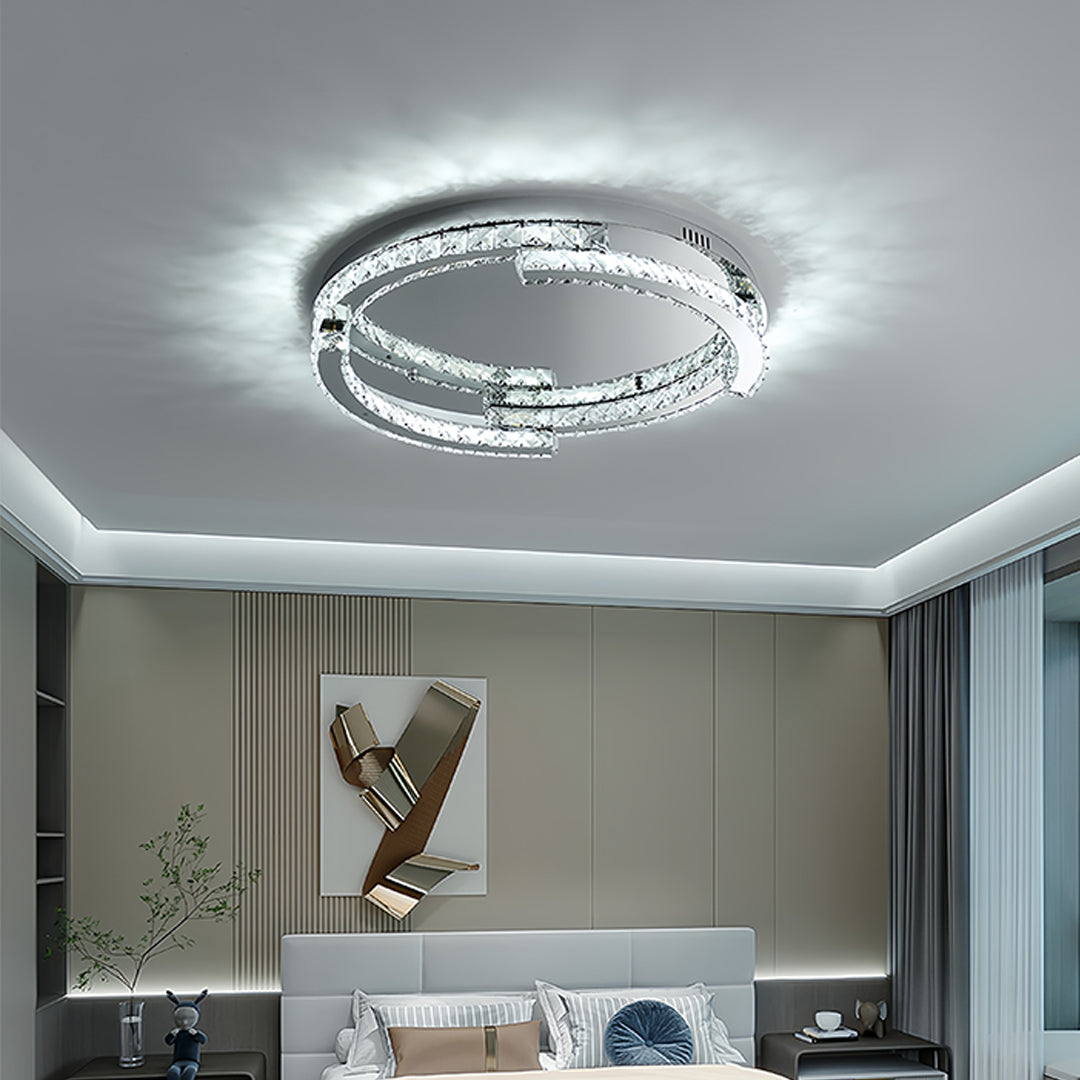 Silver flush mount ceiling light providing bright illumination in modern minimalist room setting