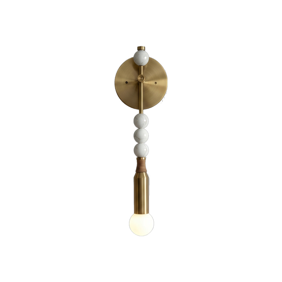Contemporary silver wall lights with black circular backplate and stacked decorative bead design.