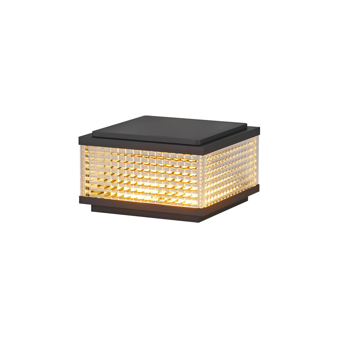 Elegant large outdoor solar pillar lights with black top frame and warm illuminated textured panels.
