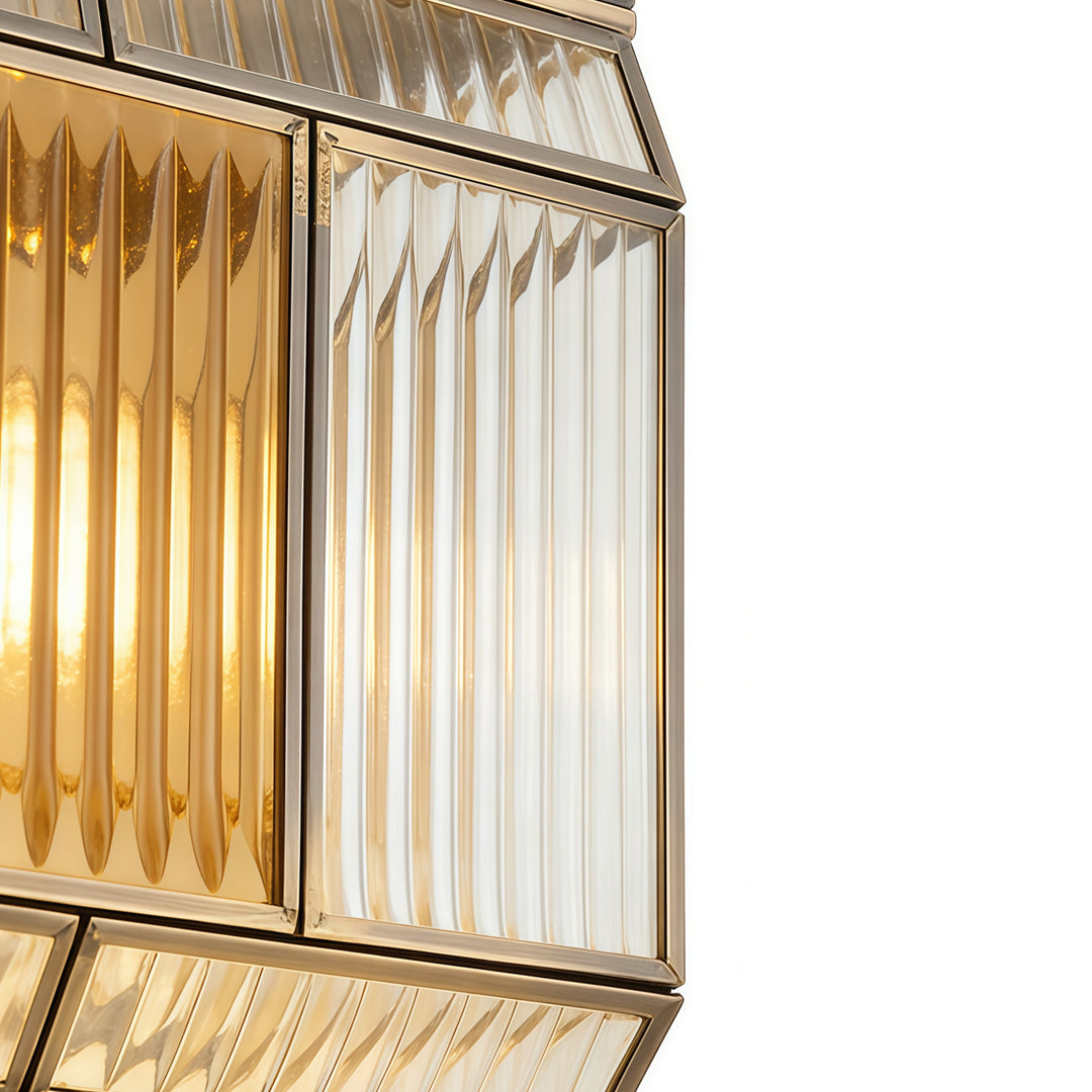Silver wall lights detail view showing modern cylindrical linear fixture with soft warm LED output.