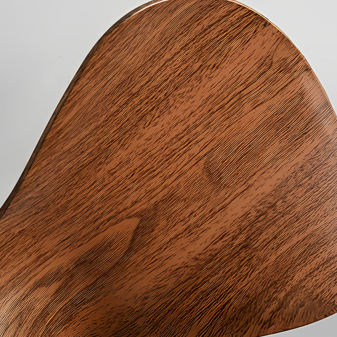 Close-up of simple white ceiling fan with light diffuser, showing smooth edges and integrated LED lighting.