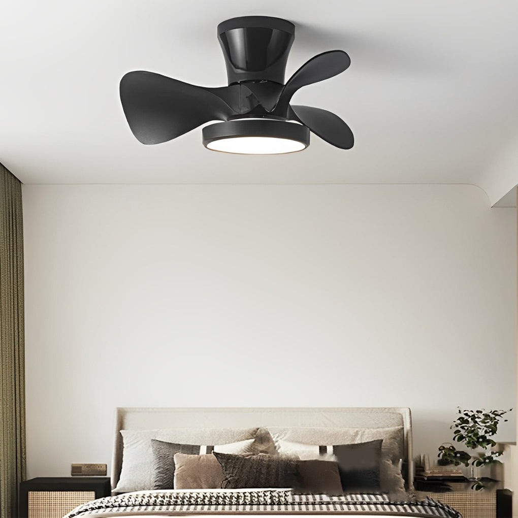Simple white ceiling fan with light paired with dark blades in a contemporary bedroom, offering contrast and functional lighting.