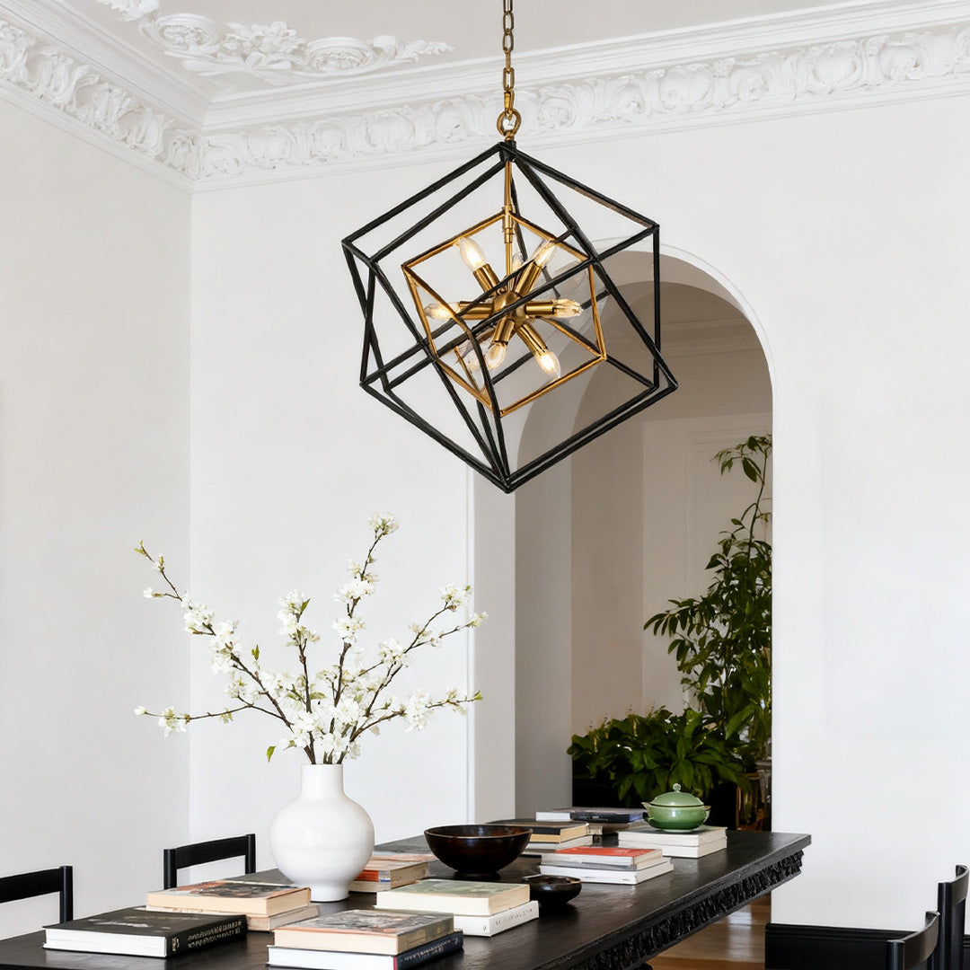 Single square pendant lights fixture providing ambient light over a clean white dining table in a contemporary minimalist setting.
