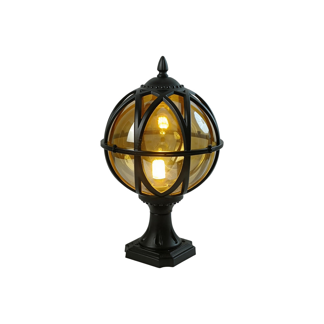 A single black globe pillar light with warm bulb glowing isolated on white studio background ok.