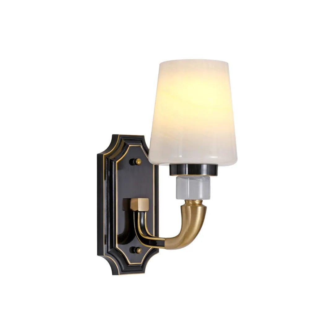 Brass candle sconces wall with a single light design and elegant white shade on white background.
