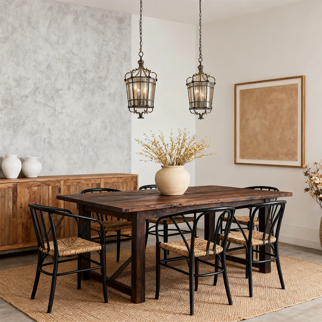 Single Italian pendant light illuminating a formal dining space with dark wood furniture and a textured, distressed wall finish.