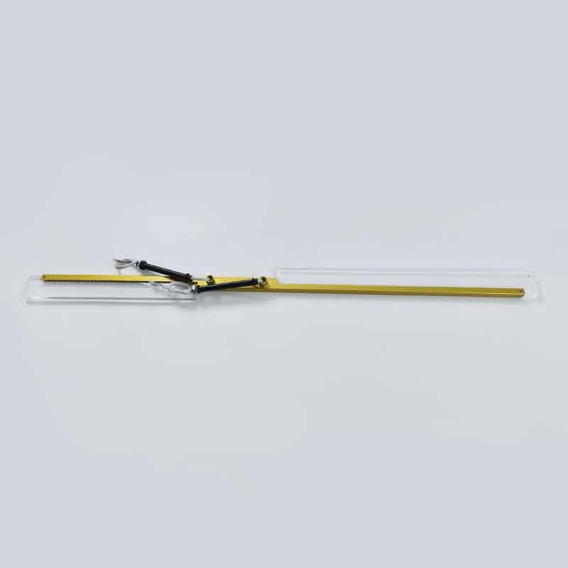 Single linear bar component with acrylic diffuser for a Gold cross ceiling light on a white bg.