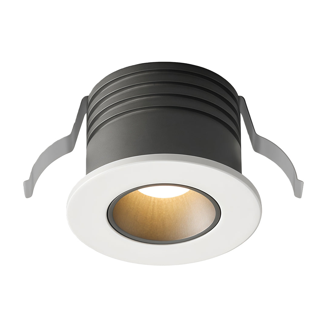 Single mini LED spotlight with black housing and gold reflector for focused directional lighting