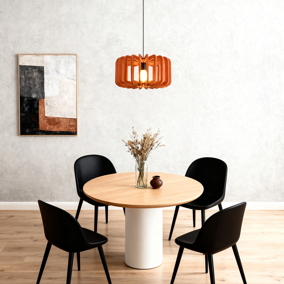 Single orange wooden slat Nordic pendant light fixture over a minimalist dining table 