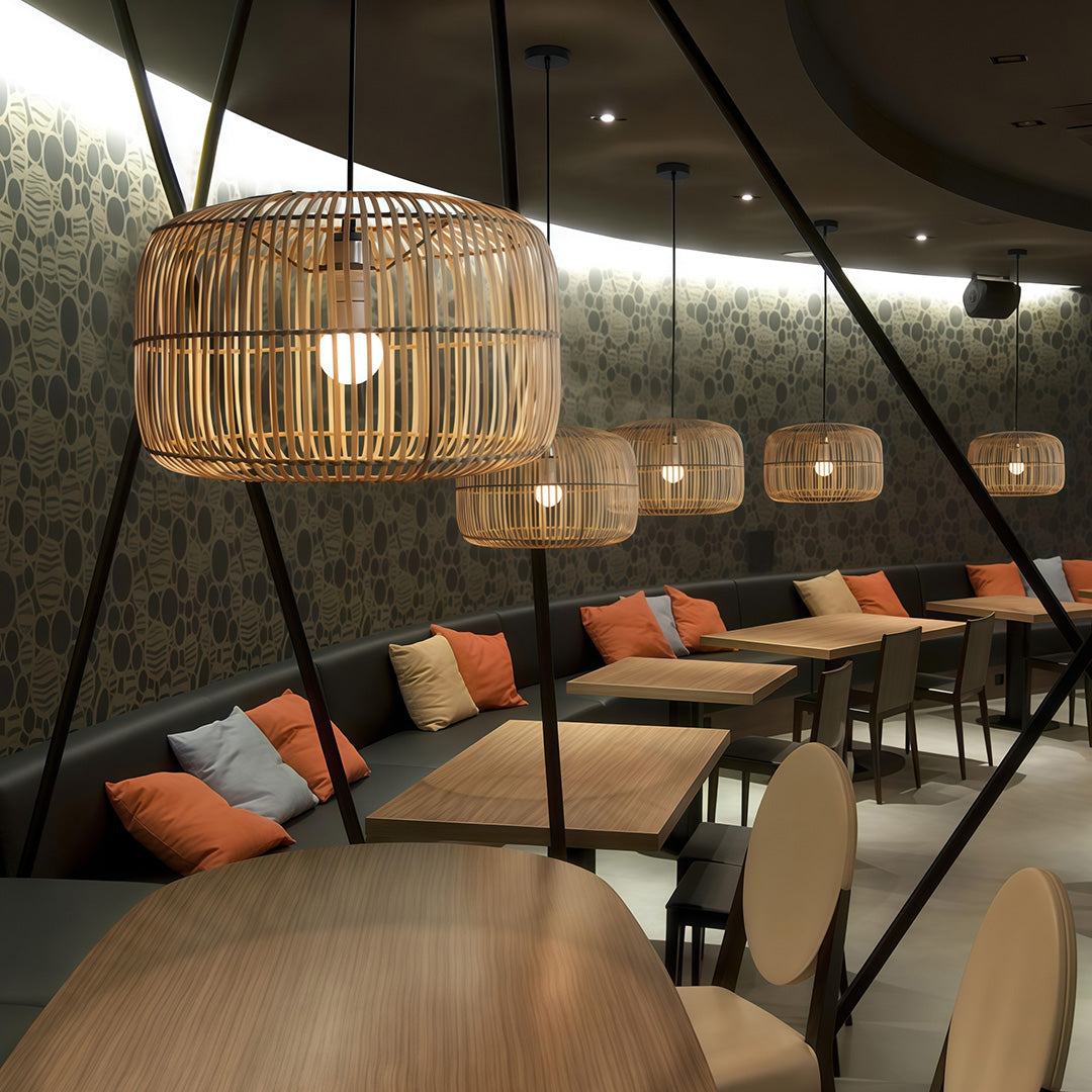 Single woven pendant light over a dining table, providing soft, rustic lighting for a cozy atmosphere.