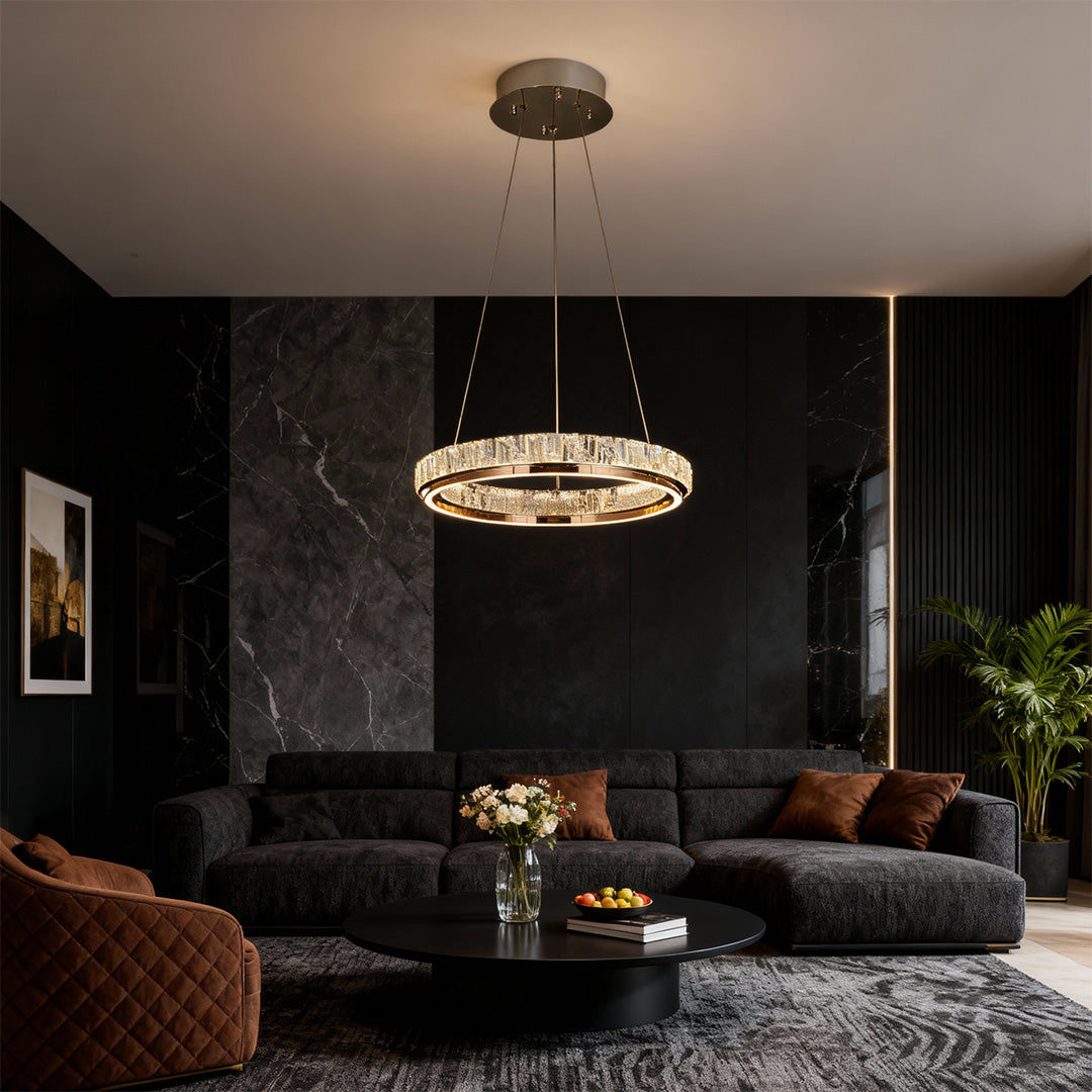 Size comparison chart of luxury modern chandeliers, showcasing three different sizes and designs.