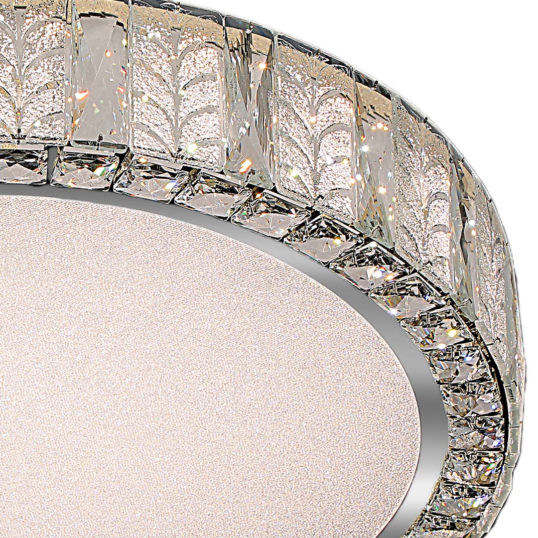 Size comparison chart of modern flush mount ceiling lights with crystal details, showcasing two different sizes and designs.