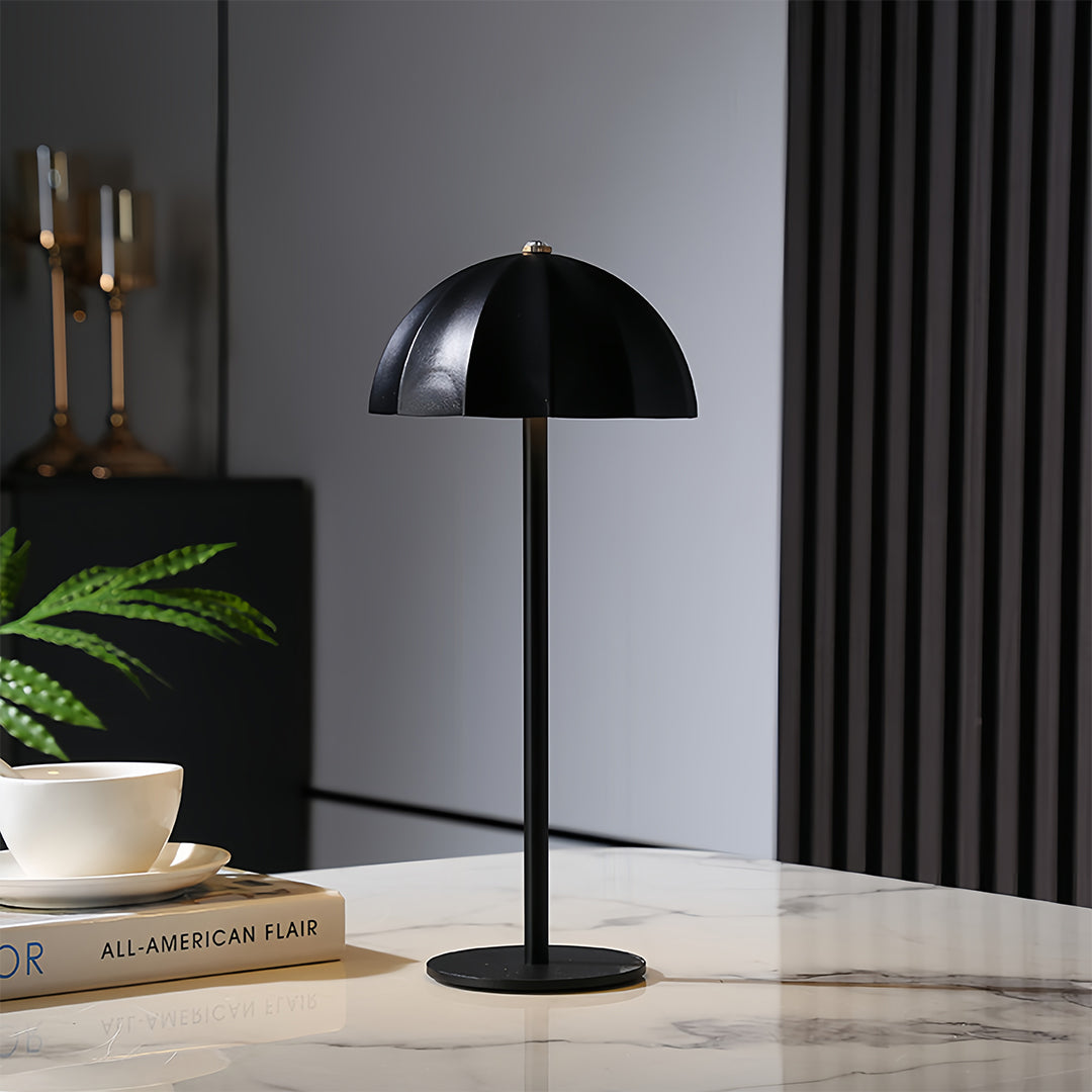 Sleek black iron table lamps creating dramatic lighting in modern workspace environment