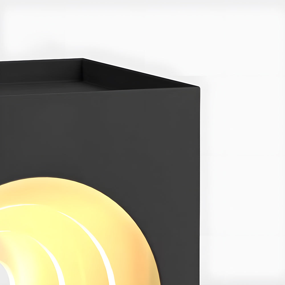 Sleek black lighted lawn decorations with warm LED glow creating sophisticated pathway illumination and landscape accent lighting