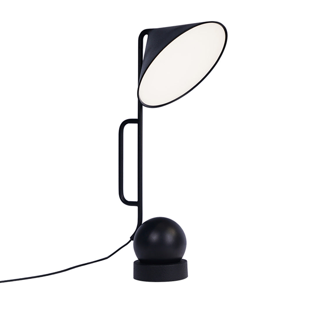 Sleek black metal USB rechargeable table lamp featuring flexible positioning and cord design