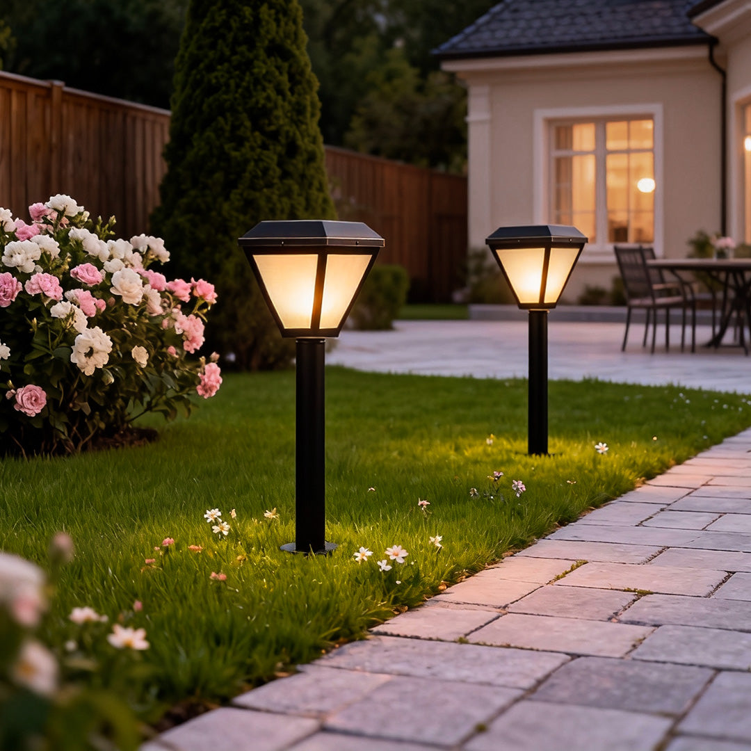 Sleek exterior path lighting along a paved walkway, creating a welcoming ambiance for the home entrance.