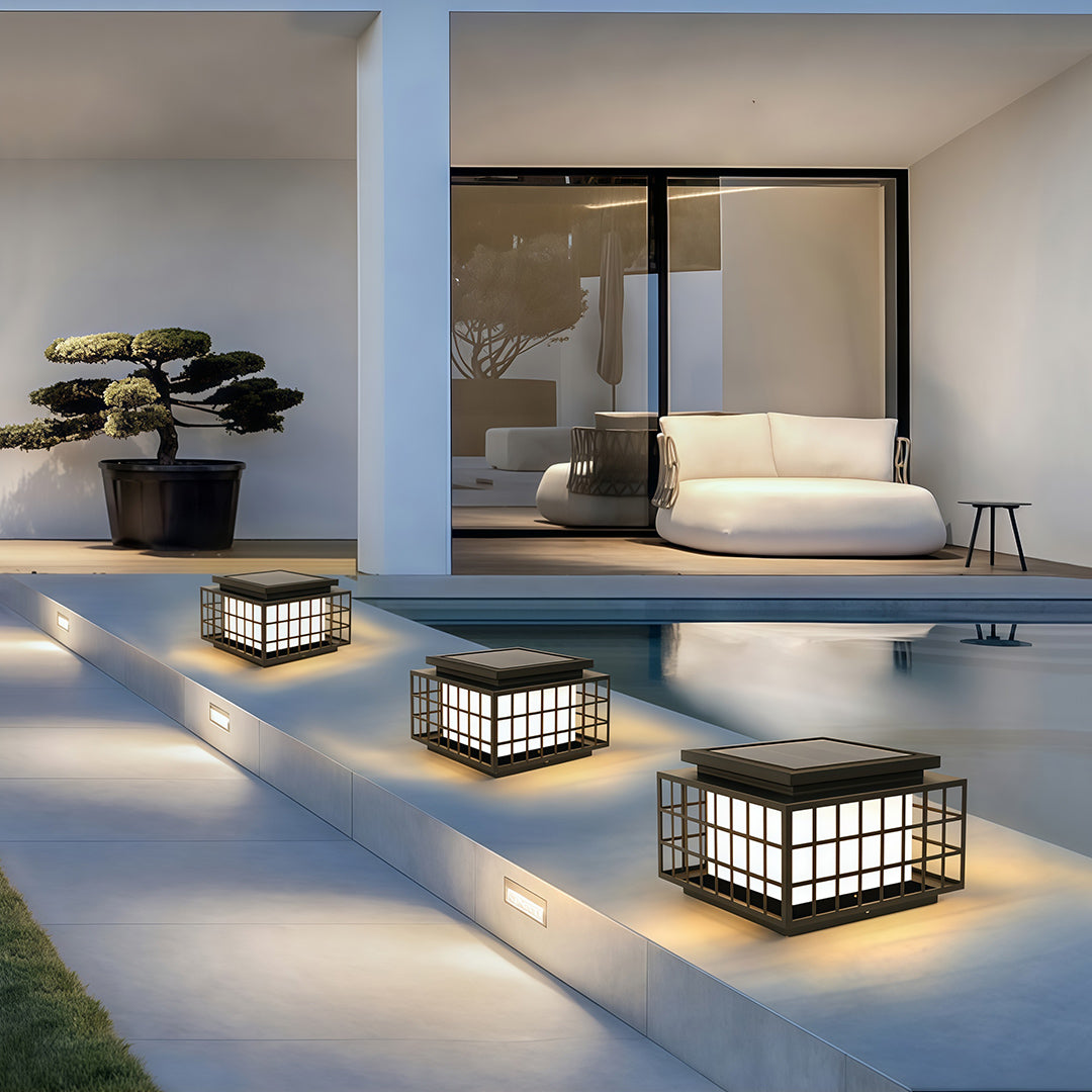 Modern gate pillar light with a black square design, showcasing its sleek and functional outdoor lighting.