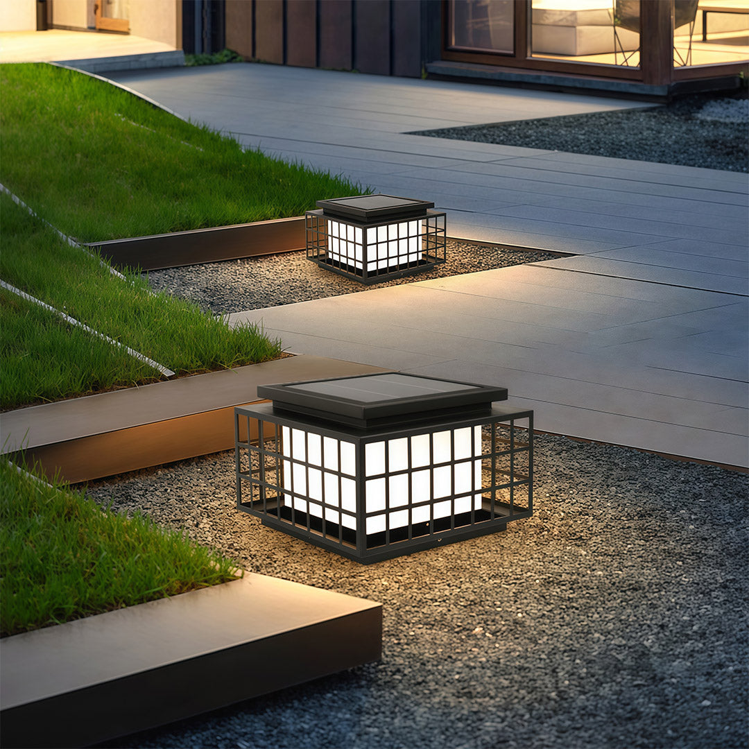 Modern gate pillar light with a black square design, showcasing its sleek and functional outdoor lighting.