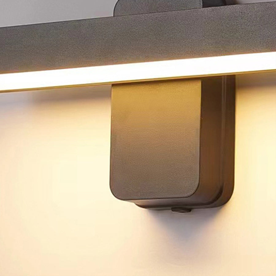 Sleek horizontal wall sconce with integrated LED providing ambient room lighting