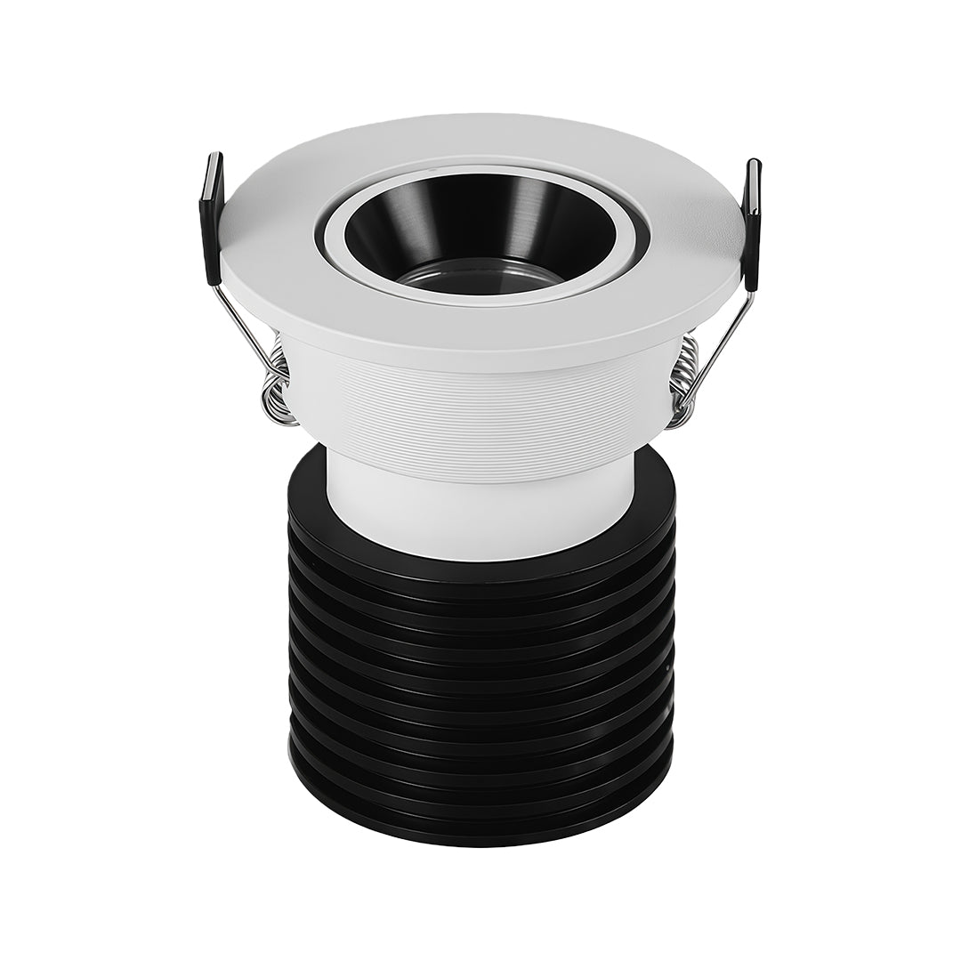 Sleek indoor spotlights with textured black body and white bezel, glass shade chandelier style reflector for directional lighting.