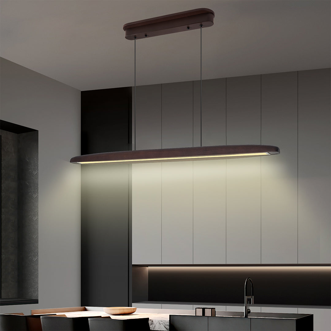 Enhance your home decor with linear LED pendant lighting in a dark wood finish, perfect for creating stylish and ambient lighting in any room.