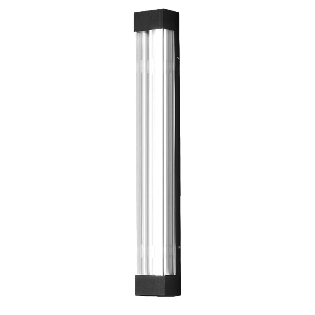 Sleek linear outdoor sconce in a silver/chrome finish with a clear ribbed glass diffuser, shown unlit.