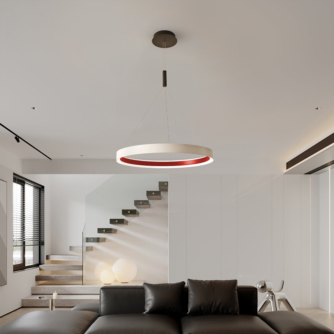 Sleek modern ring chandelier featuring glass shade chandelier aesthetic creating ambient lighting in open-concept living area.