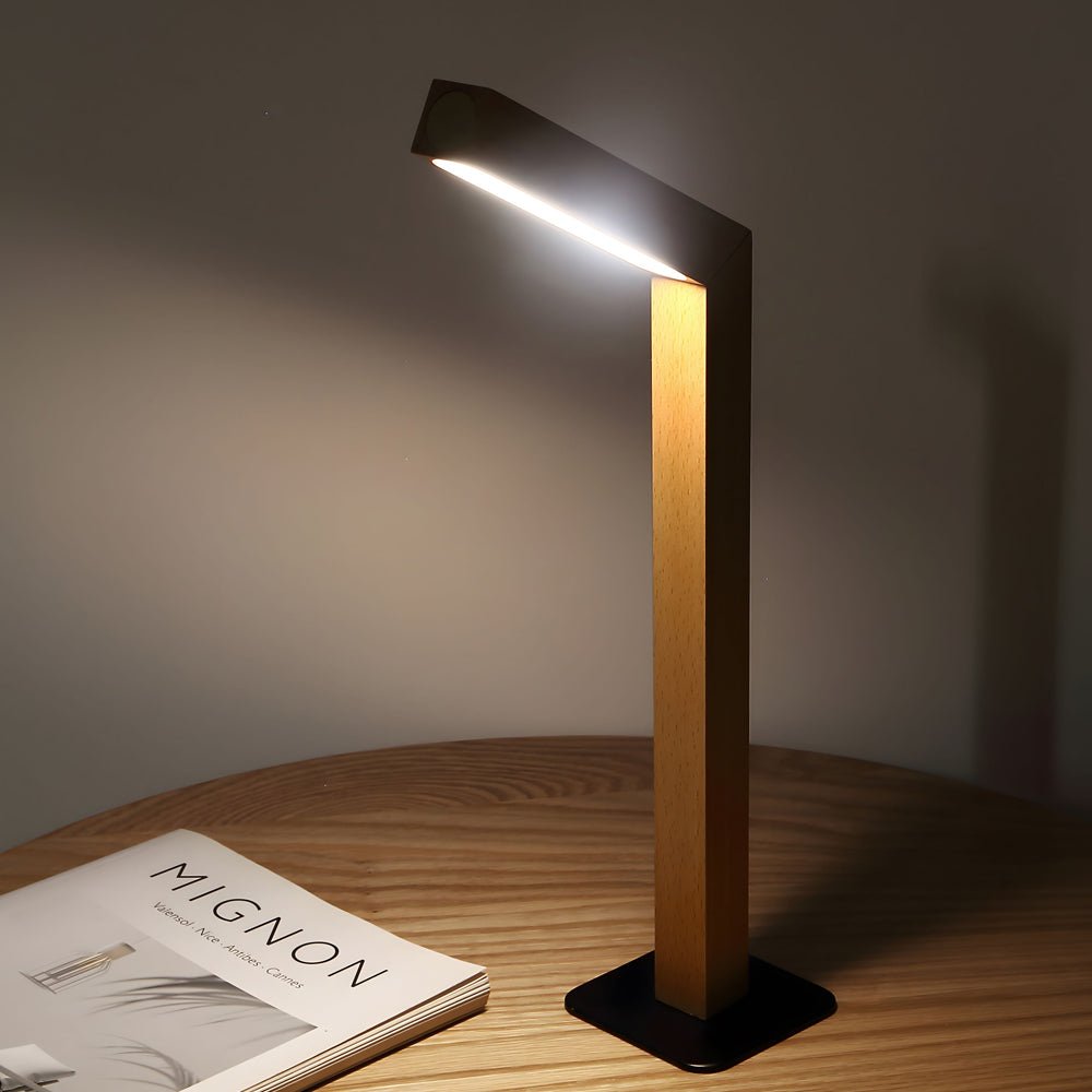 Sleek Nordic LED desk light with a clean, wooden finish and adjustable head for versatile desk lighting.