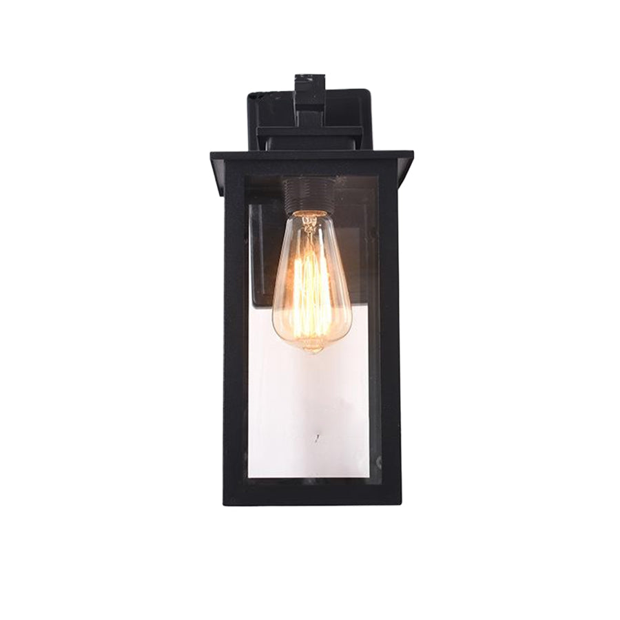 Sleek black outdoor light fixture with clean lines and transparent glass housing