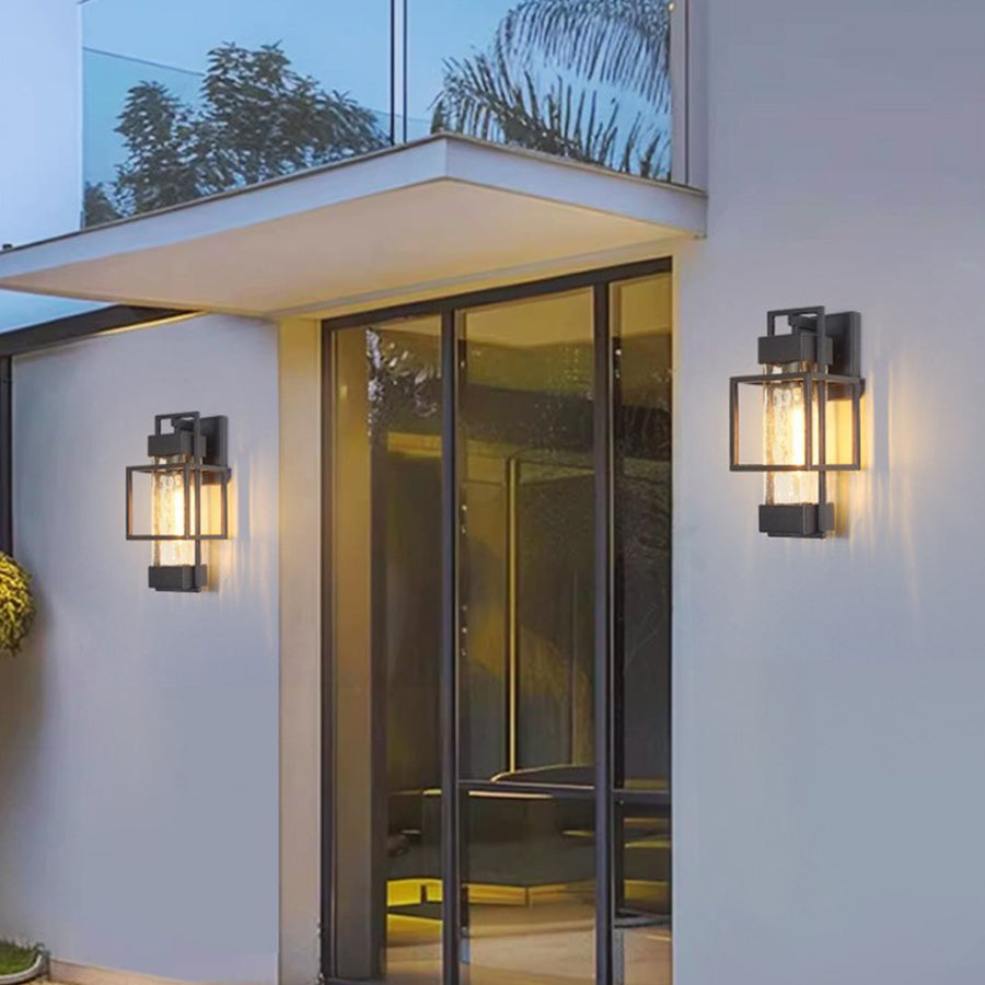 Sleek outdoor wall sconces providing warm lighting on minimalist residential building facade