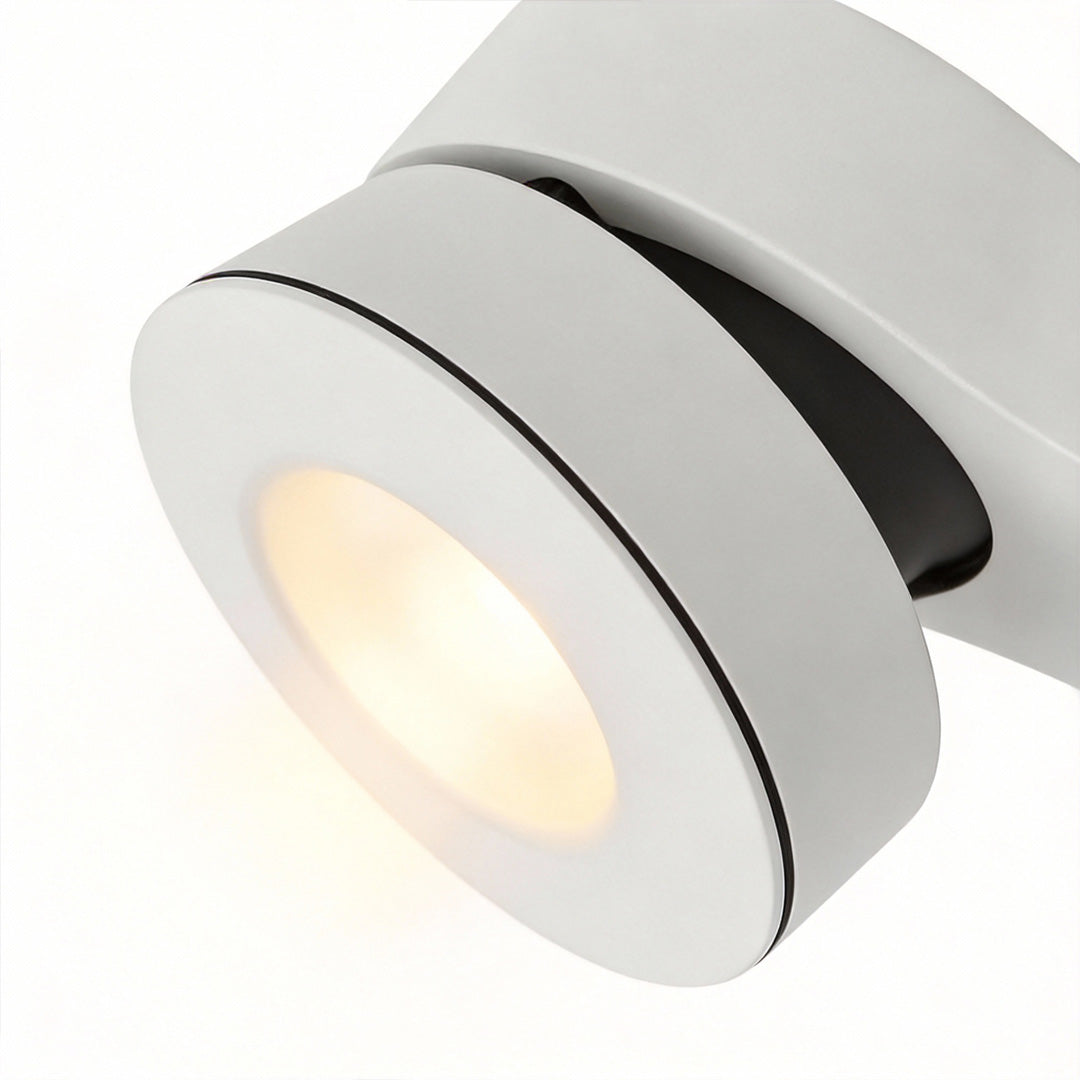 Sleek white surface mount LED downlight designed for efficient, minimalist lighting in stylish, modern living spaces.