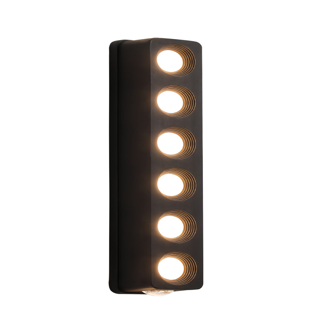 Slim rectangular unique outdoor wall lighting fixture with evenly spaced round cutouts for modern illumination.