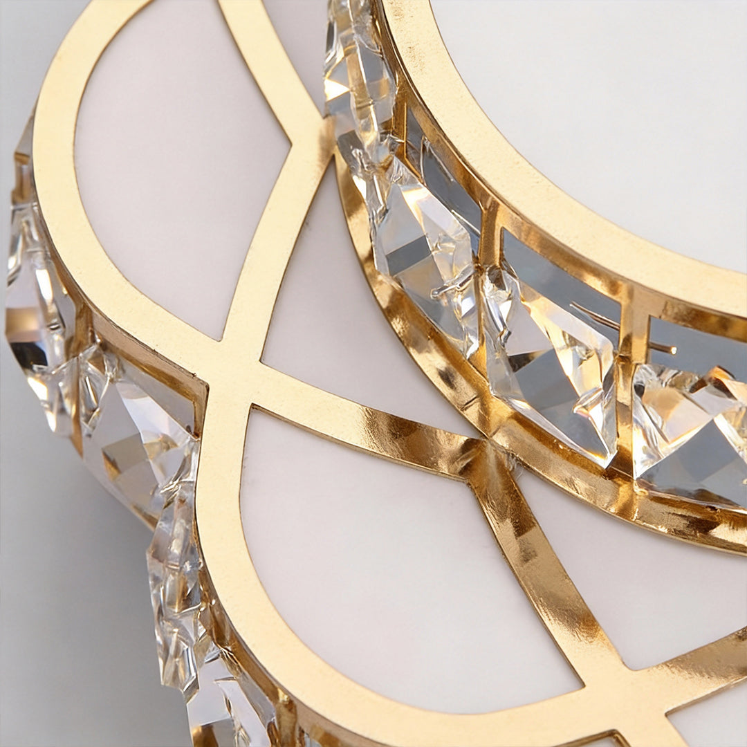 Small crystal flush mount ceiling light installed in a decorative ceiling layout.