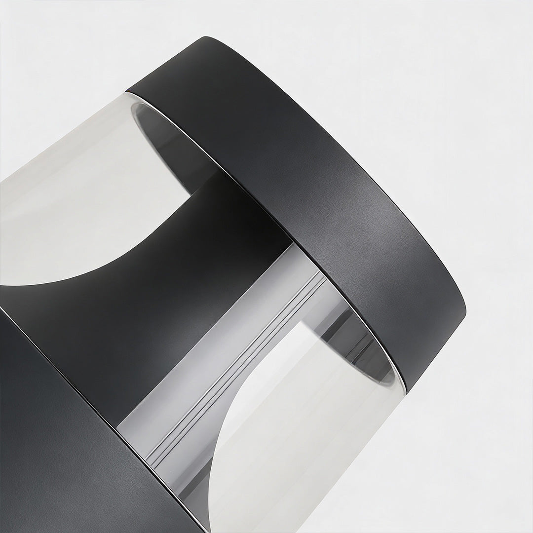 Angled view of small landscape lights lens and cap, highlighting construction details for outdoor use.