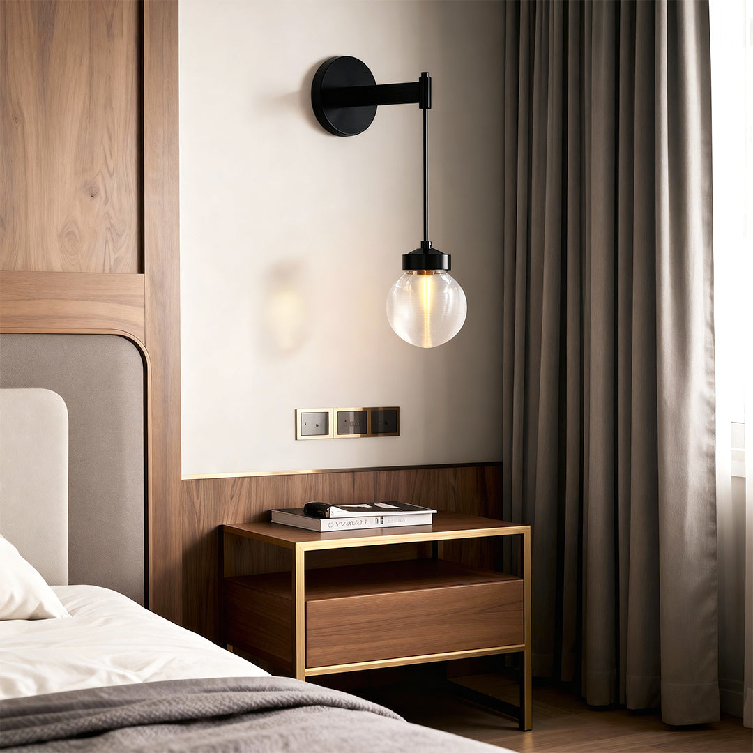 Modern luxury chandeliers creating warm atmosphere in contemporary bedroom with neutral tones