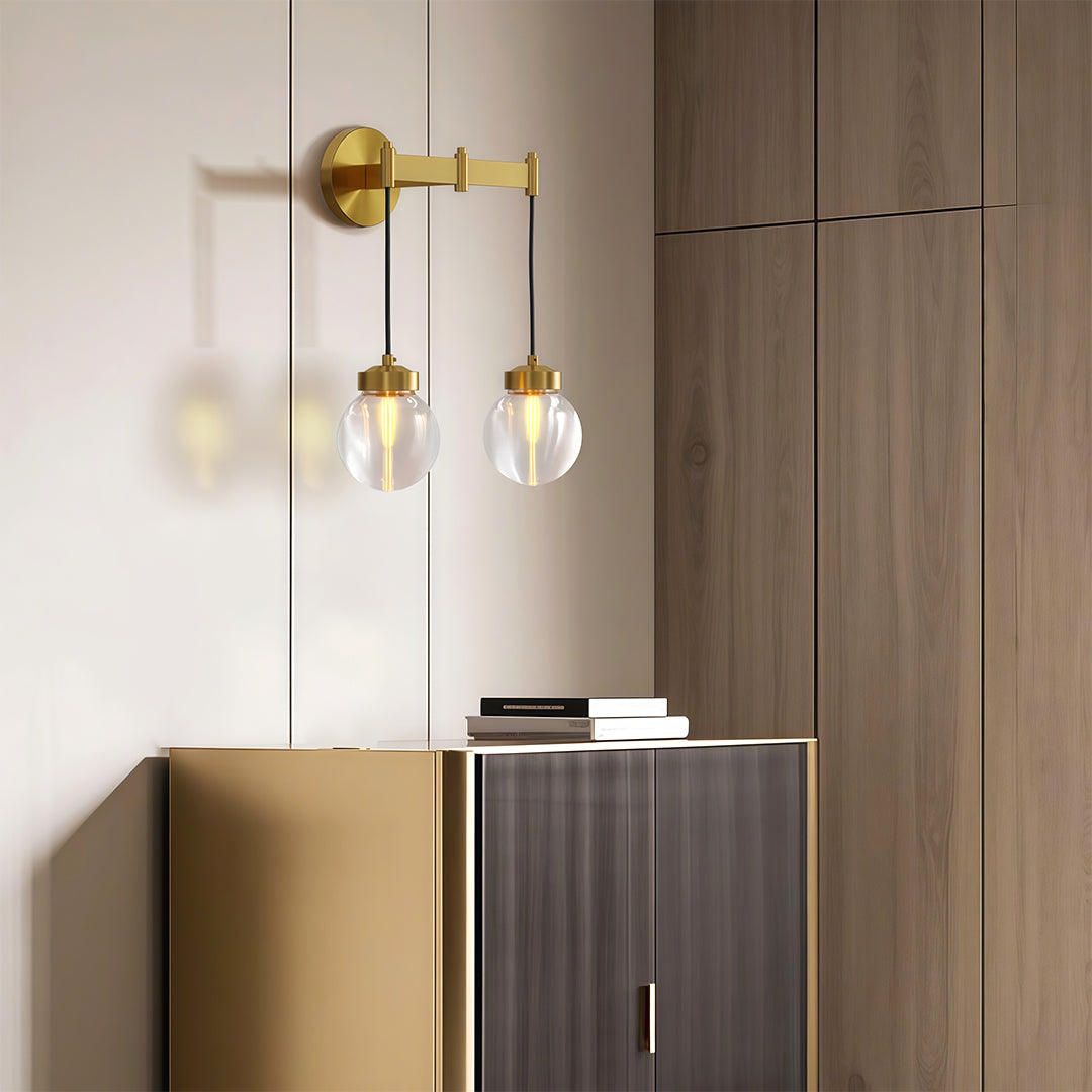 Small modern chandeliers enhancing elegant entryway with modern console and decor